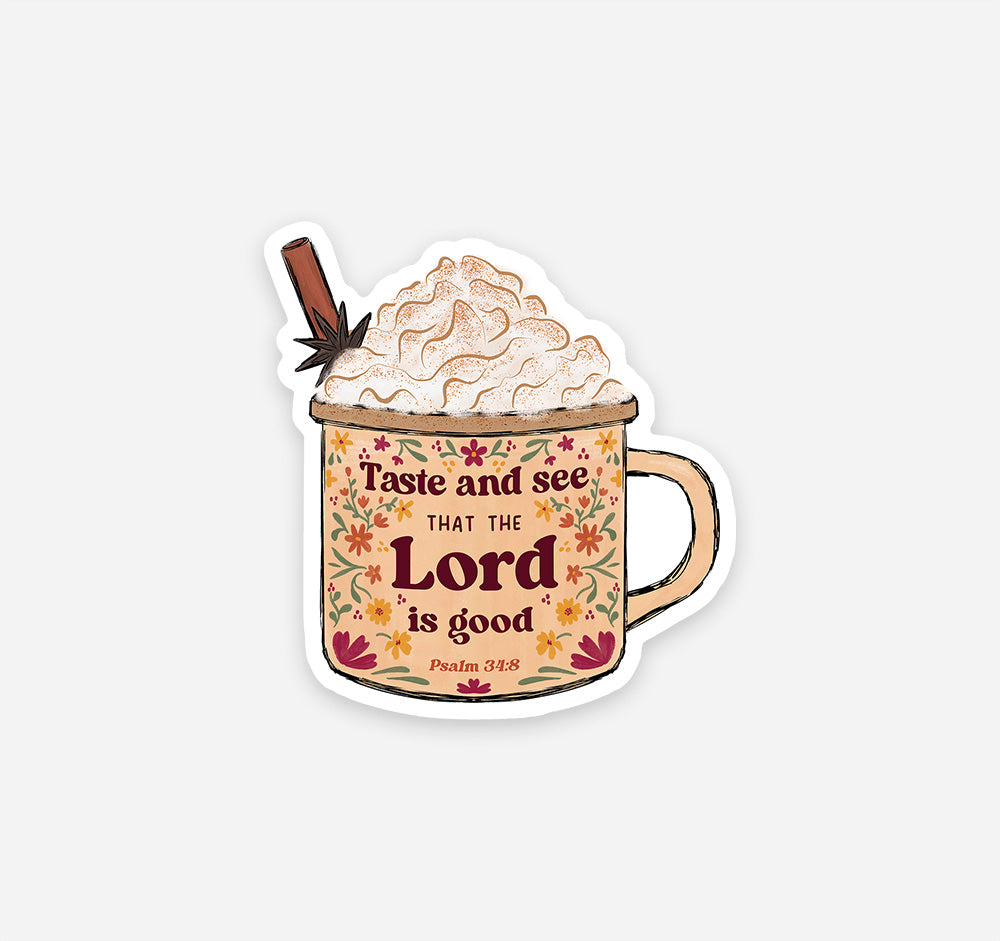 A die-cut sticker featuring a mug filled with whipped cream and a cinnamon stick, with the text &