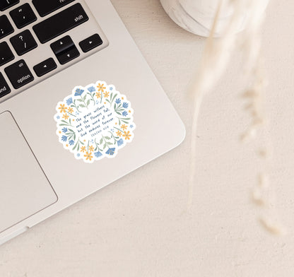 Isaiah 40:8 Bible verse Christian faith sticker with blue and yellow florals on a laptop