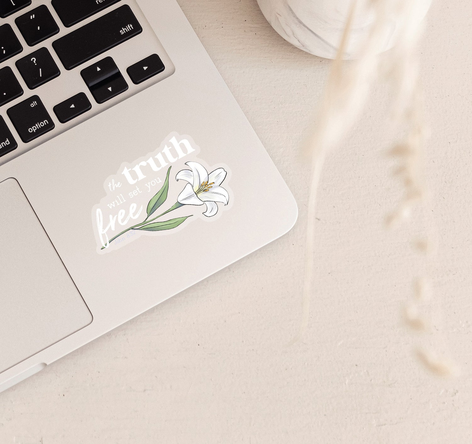 The truth will set you free, John 8:32 Bible verse Christian laptop sticker with a white lily