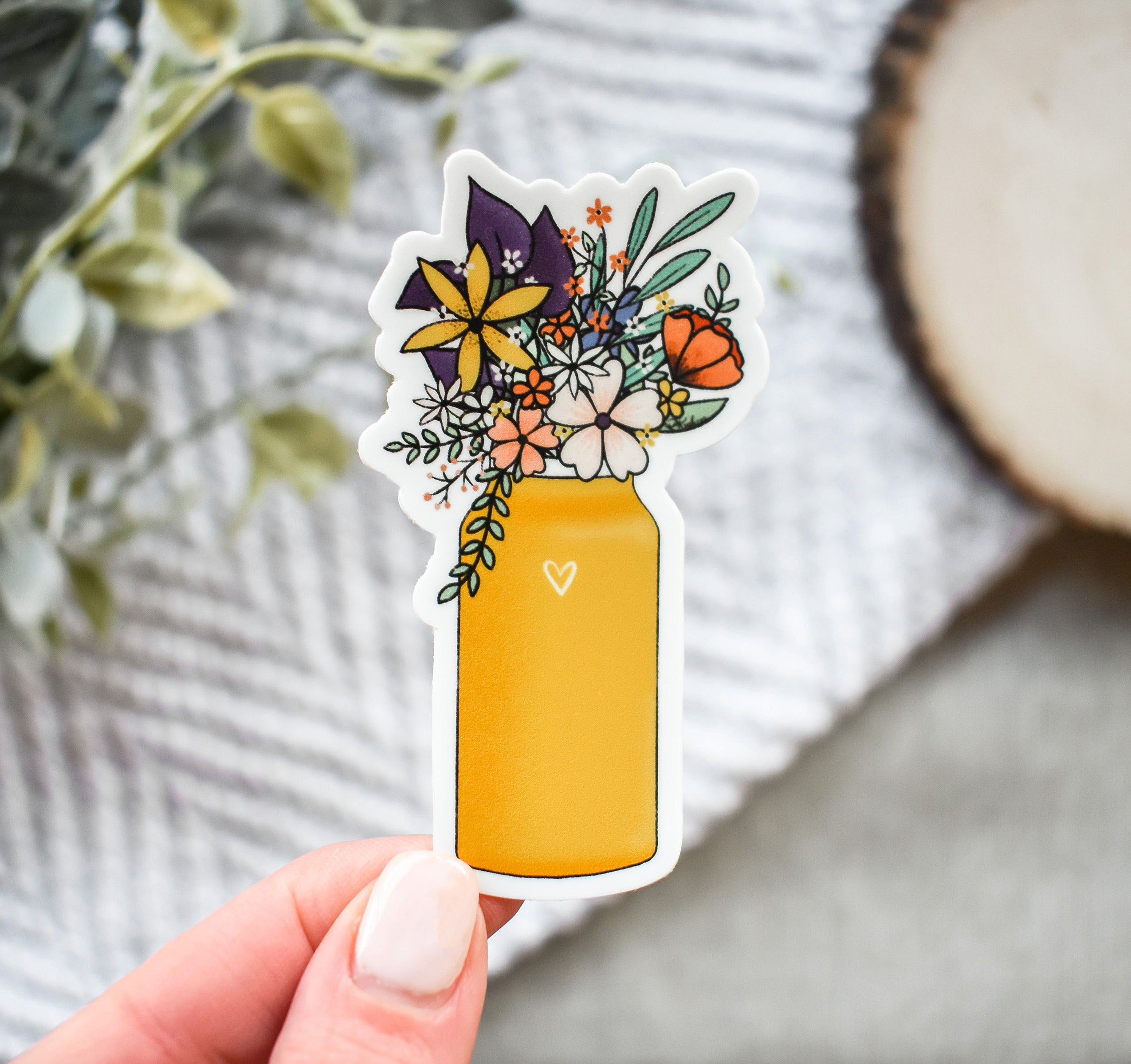 Yellow metal water bottle sticker with wildflowers