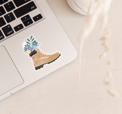 Watercolor style hiking boot full of flowers laptop sticker