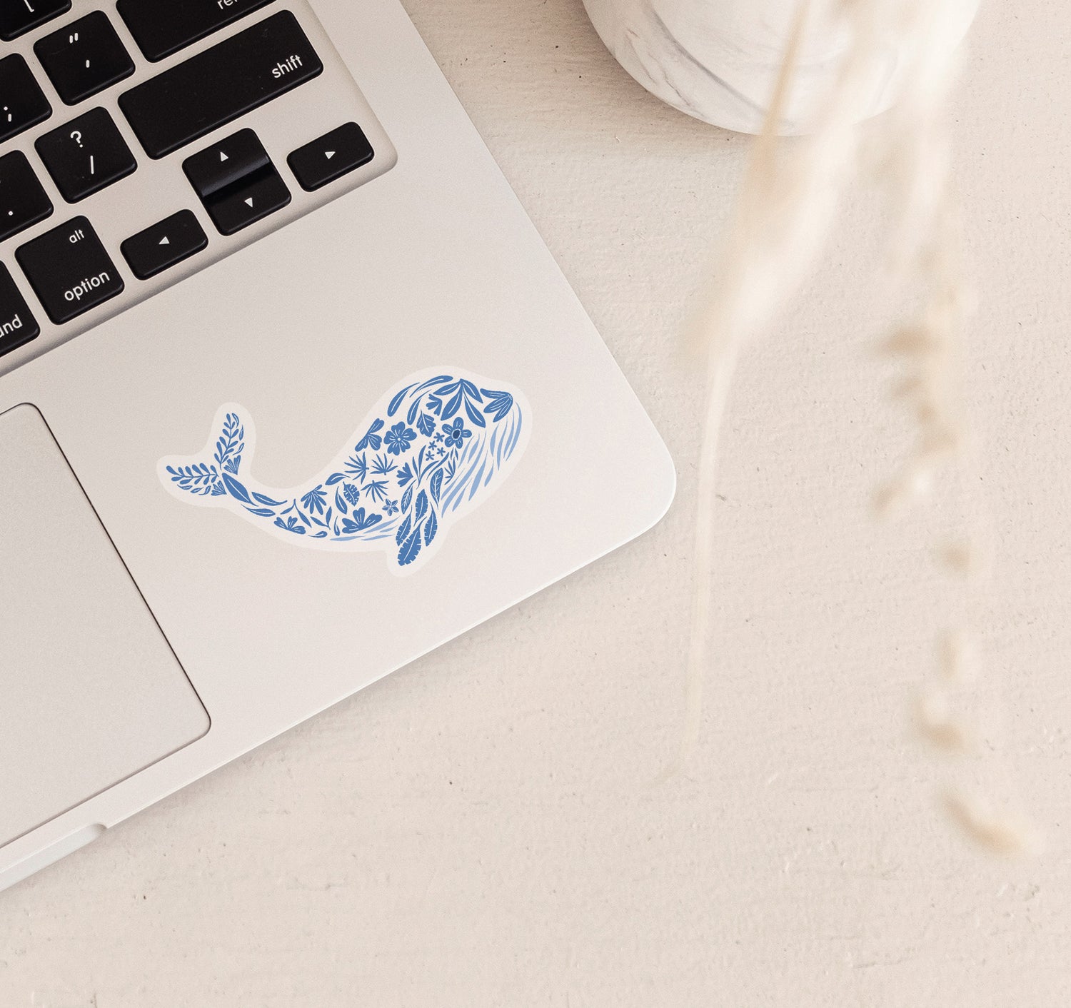 Blue whale laptop sticker designed with floral pattern