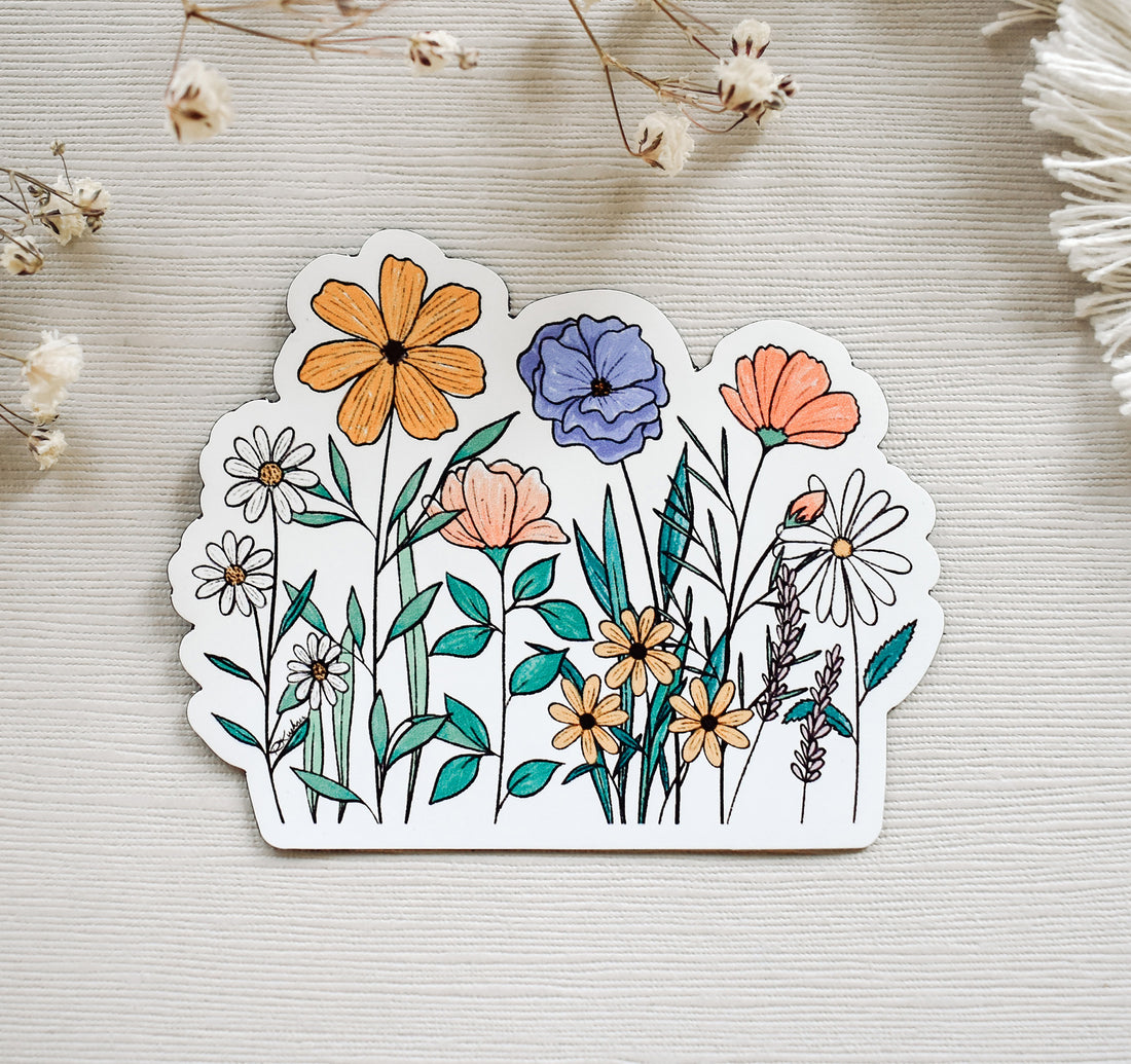 Beautiful and colorful wildflowers on a magnet