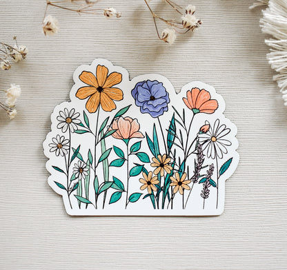 Beautiful and colorful wildflowers on a magnet