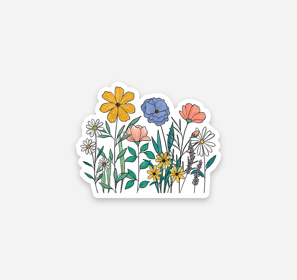 A floral magnet design of pink, blue, yellow, and white wildflowers