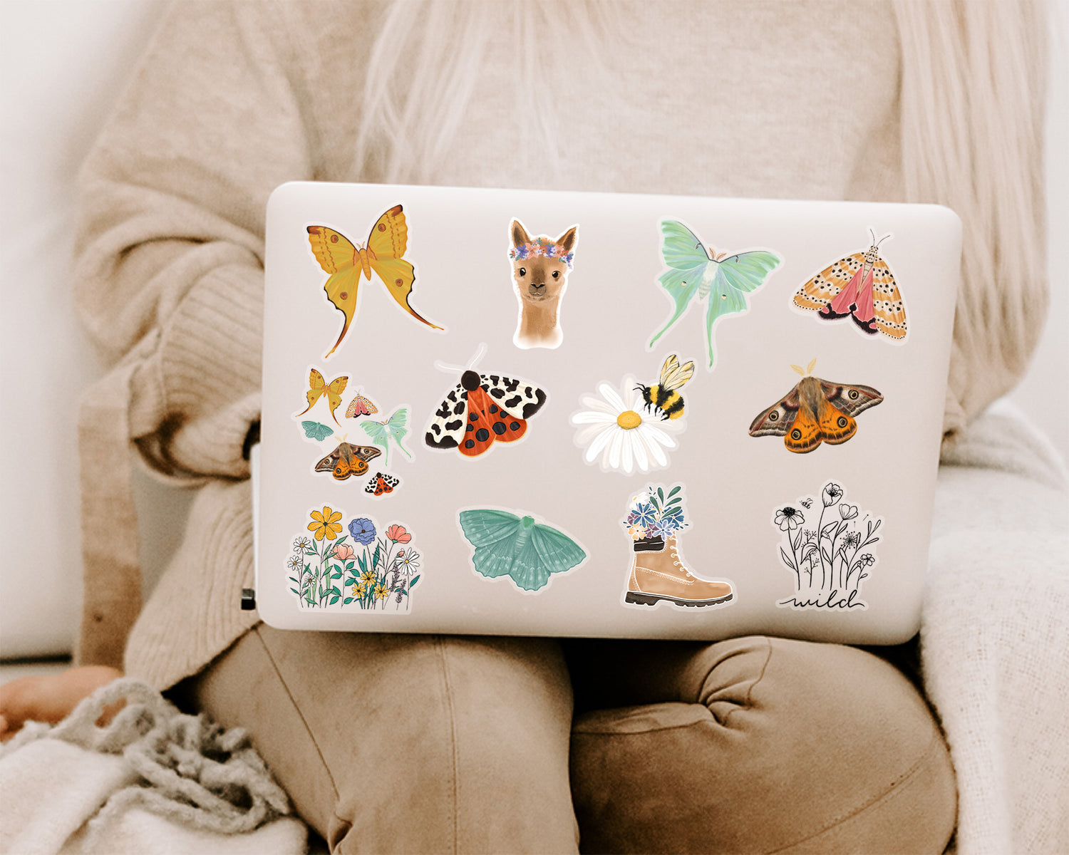 Nature and floral themed stickers decorating a laptop lid