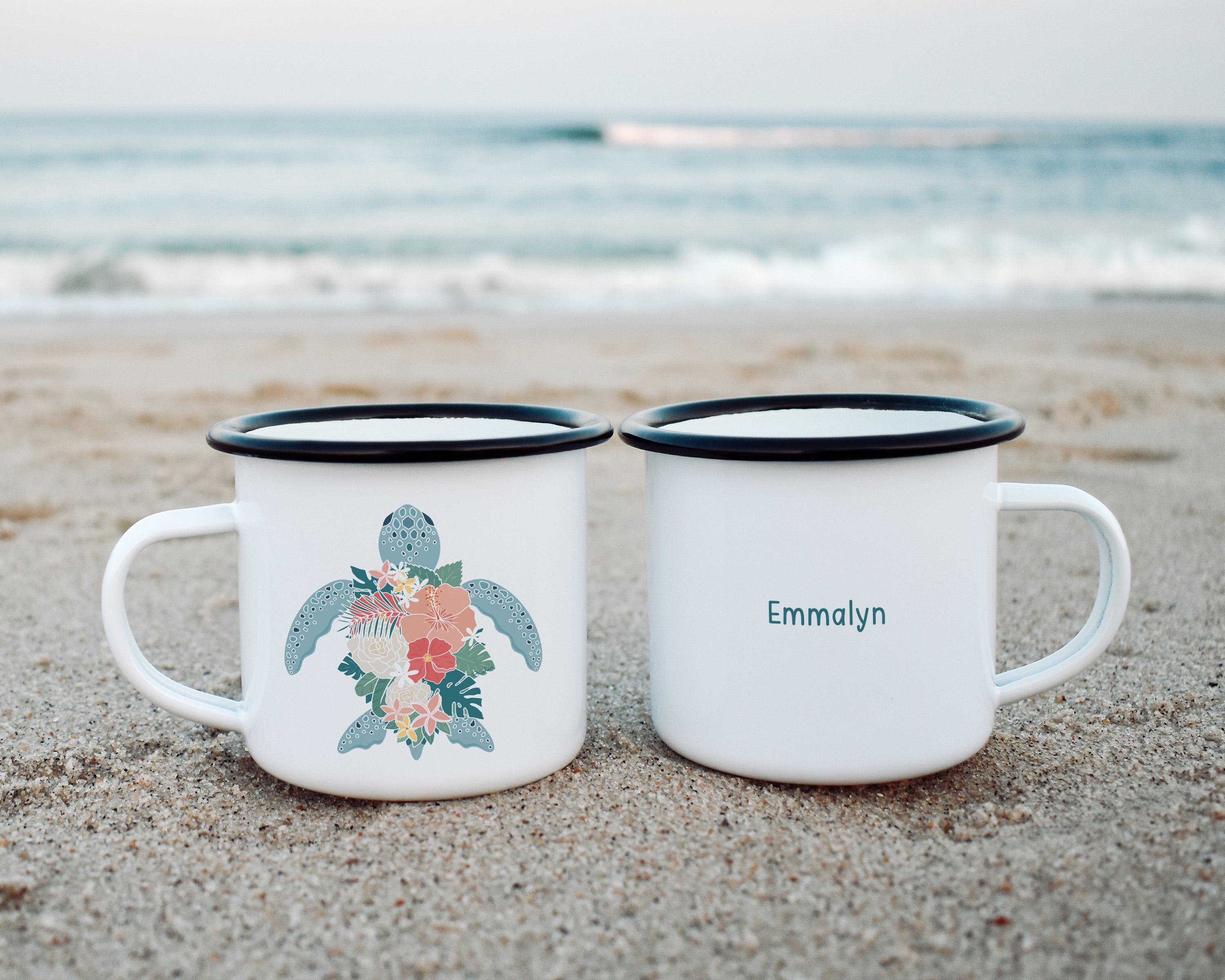 A Hawiian green sea turtle with tropical flowers shell and a custom name on a metal camp mug